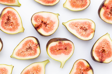 Fig fruits isolated on white background. Top view. Flat lay pattern