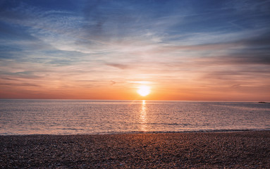 Sunset over Stony Beach in North Wales