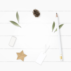 Flat lay top view elegant white composition paper leaf pine cone pencil eraser tag and star craft on wooden background