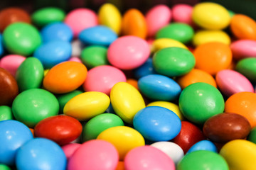 Fototapeta na wymiar Colorful chocolate candies for children