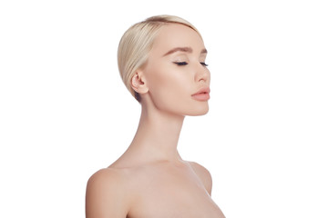 Perfect clean skin of a woman, a cosmetic for wrinkles. Rejuvenating effect on the skin care. Clean pores no wrinkles. Girl blonde on white background isolate, copy space. Healthy face skin