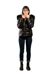 Full-length shot of Woman with glasses covering mouth with hands for saying something inappropriate