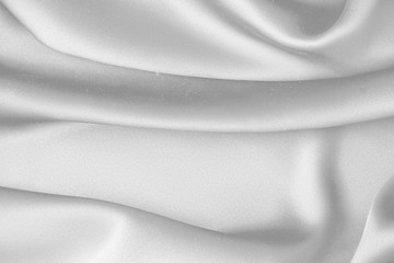 Rippled white silk fabric satin cloth waves background