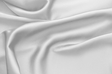 Plakat Rippled white silk fabric satin cloth waves background