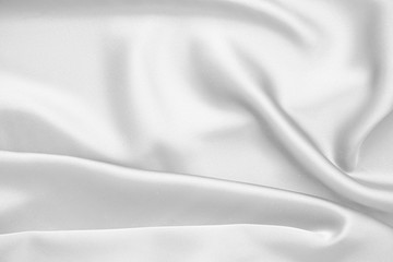 Rippled white silk fabric satin cloth waves background