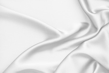 Rippled white silk fabric satin cloth waves background