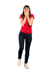 Full-length shot of Woman with glasses with surprise and shocked facial expression