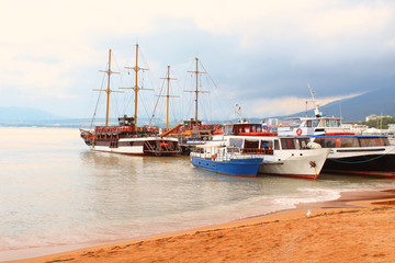 Sea port. Pleasure boats on the beach. Close-up. Background. Landscape.