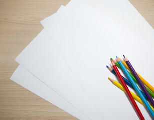 colored pencils and paper before creativity