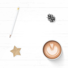 Flat lay top view elegant white Christmas composition paper pine cone pencil coffee and star shape craft on wooden background