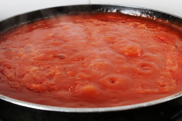 ed bright sauce in a pan cooking