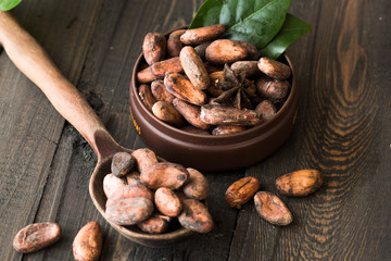  cacao nibs cacao beans on old wooden background