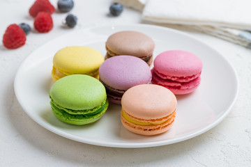 multicolored macaroons in plate
