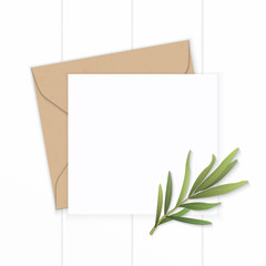 Flat lay top view elegant white composition letter kraft paper envelope tarragon leaf on wooden background
