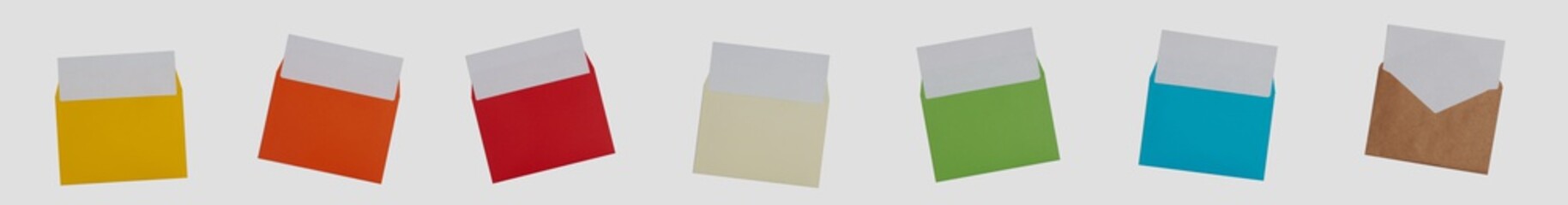 Envelopes yellow, orange, red, ivory, green, blue, kraft on a white background