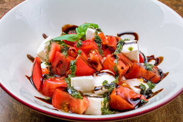Caprese salad with mozzarella and tomato