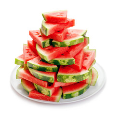 slices of watermelon on plate isolated on white