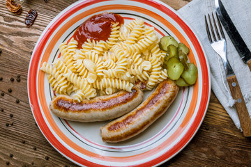 fried pork sausages on the Board