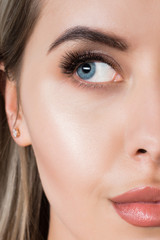 Closeup image of beautiful woman eye with fashion makeup and long eyelashes