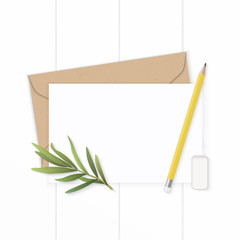 Flat lay top view elegant white composition letter kraft paper envelope yellow pencil tarragon leaf and eraser on wooden background