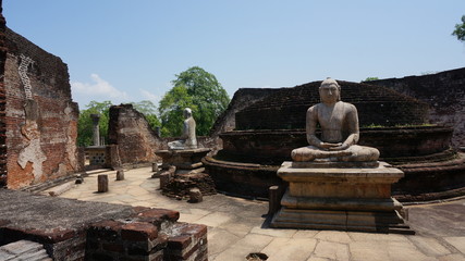Fototapeta na wymiar The Sacred Quadrangle with buddha, Ancient ruins Sri Lanka, Unesco ancient city Polonnaruwa, Sri Lanka
