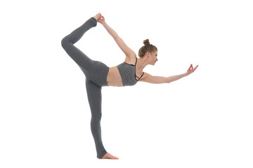 Girl practices yoga isolated on white background.