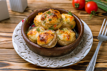 mushrooms baked with Suluguni cheese