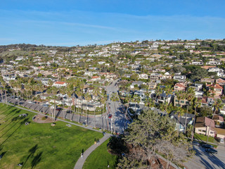 Fototapeta na wymiar Aerial view of La Jolla little coastline city with nice beautiful wealthy villas with swimming pool. La Jolla, San Diego, California, USA. West coast real estate development.