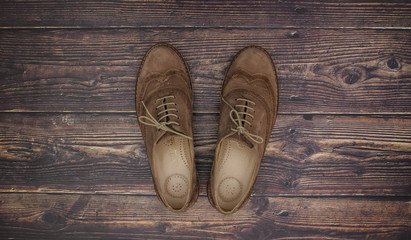 Woman shoes on wooden table