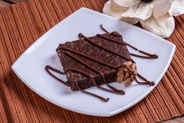 Chocolate cake with cream at the fair.