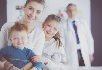 Little children with her mother at a doctor on consultation