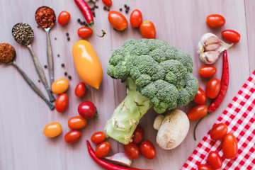 Fresh vegetables on a wooden table close-up.