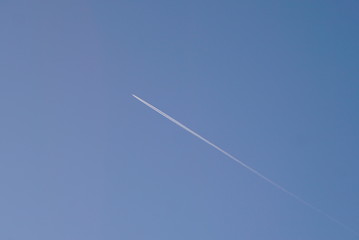 Flying Airplane On The Blue Sky