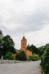 Fototapeta na wymiar View of the Radomysl Castle. Ukraine. The architecture of the stone castle Radomysl. Ancient castle.