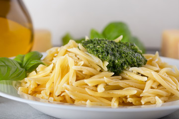 Classical italian trofie pasta with pesto sauce