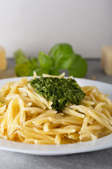 Classical italian trofie pasta with pesto sauce