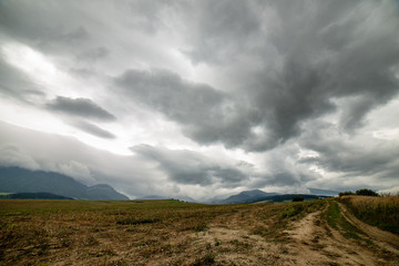 storm clouds over fields in slovakia