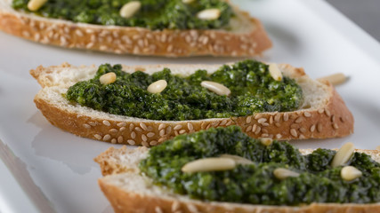 Traditional Italian Fresh sandwich with pesto genovese, selective soft focus