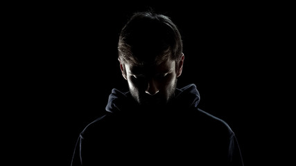 Former criminal feeling guilty, regret on serious male face, guy making decision