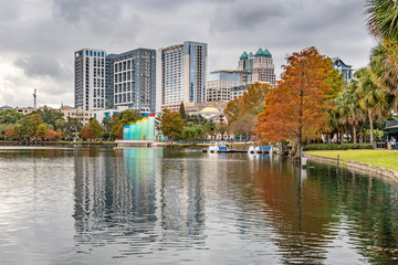 ORLANDO, FLORIDA, USA - DECEMBER, 2018: Eola Lake Park with vibrant autumn fall colors.