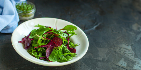 Healthy salad, leaves mix salad (mix micro greens, juicy snack). food background - Image