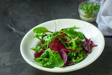 Healthy salad, leaves mix salad (mix micro greens, juicy snack). food background - Image