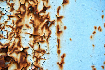 cracked color on a wall outside