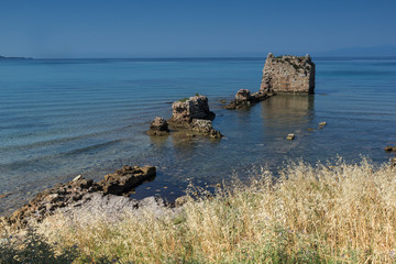 Ancient ruins at coastline of town of Nea Poteidaia, Kassandra, Chalkidiki, Central Macedonia,...