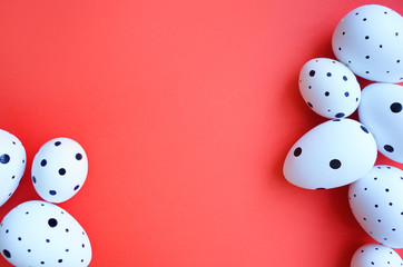 Easter eggs on red background. Happy Easter card. Copy space