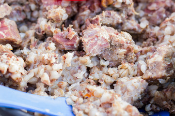 Background and texture from food. Buckwheat porridge texture.