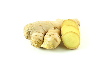 Fresh ginger root and ginger slice isolated on white background