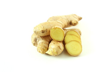 Fresh ginger root and ginger slice isolated on white background