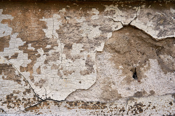 cracked color on a wall outside