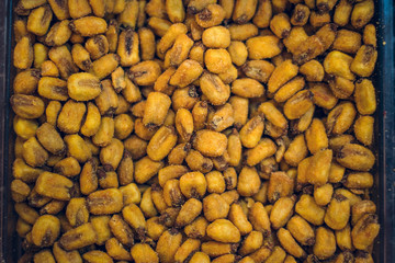 salty fried corn pieces snacks food texture concept background